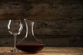 Elegant decanter with red wine and glass Royalty Free Stock Photo