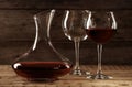 Elegant decanter with red wine and glasses