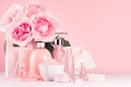 Elegant decor for romantic girlish dressing table - different bath and spa cosmetics, accessories, roses bouquet, round mirror.