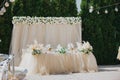 Elegant decorations of beige and white outdoor wedding reception venue Royalty Free Stock Photo