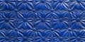 Elegant deep blue embossed leather texture with geometric floral patterns and subtle highlights Royalty Free Stock Photo