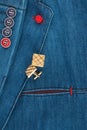 Elegant denim suit with a gold cufflinks. Male jacket with gold cufflinks and pocket, close-up. Men`s fashion. Royalty Free Stock Photo