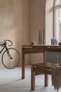 Elegant dining room interior composition with wooden dining table, armchair, bike and design home decorations. home staging.