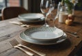 Elegant dining table set with beautiful place settings and glassware Royalty Free Stock Photo
