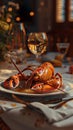 Elegant dinner setting with lobster, wine, and salad under soft lighting, creating a romantic and luxurious atmosphere. Royalty Free Stock Photo