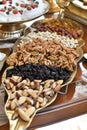 Elegant display of assorted nuts and dried fruits on a decorative platter