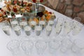 Elegant display of champagne glasses arranged for a wedding toast, sparkling white wine for a celebratory moment