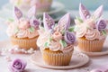 Elegant Easter cupcake with bunny ears, sugar flowers and frosting