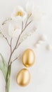 Elegant easter flat lay with tulips, golden eggs, and willow branches on a soft neutral background Royalty Free Stock Photo