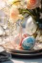 Elegant Easter Table: Colorful Eggs, Lace Tablecloth, and Botanical Wallpaper