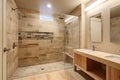 elegant eco-friendly bathroom with dual shower heads and natural stone tile