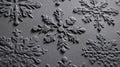 Embossed Snowflake Tessellation on Matte Graphite with Raking Light Royalty Free Stock Photo