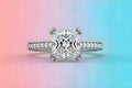 AI-generated Elegant Emerald-Cut Diamond Ring On Pastel Gradient Background Royalty Free Stock Photo