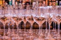 Elegant empty row of wine glasses.Many empty glass on bar ready to fill wine.clean glasses in restaurant.glasses on Royalty Free Stock Photo