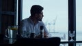 Elegant entrepreneur having lunch break in panoramic restaurant. Success concept Royalty Free Stock Photo