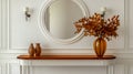 An elegant entryway console table with an orange glass top, adorned with a large mirror Royalty Free Stock Photo