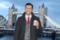 Elegant ethnic businessman around London Bridge Royalty Free Stock Photo