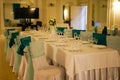 Elegant Event Table Setting with Teal and White Decor Royalty Free Stock Photo