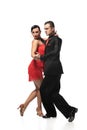 Elegant, expressive couple of dancers performing tango