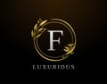 Elegant F Letter Floral Design. Circle Luxury F Gold Logo Icon Royalty Free Stock Photo