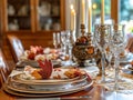 Elegant Fall Table Setting with Candles, Glasses, and Leaf-Themed Napkin Royalty Free Stock Photo