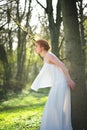 Elegant fashion bride in white dress standing outdoors Royalty Free Stock Photo