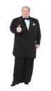 Elegant fat man in a tuxedo shows thumb-up Royalty Free Stock Photo