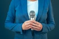 Elegant female journalist conducting business interview or press Royalty Free Stock Photo