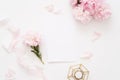 Elegant feminine wedding or birthday flat lay composition with pink peonies Royalty Free Stock Photo