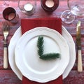 Elegant and festive Christmas Table Setting. Royalty Free Stock Photo