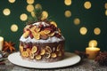 Elegant festive fruit cake with candied fruits and pieces of dried berries