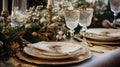 Elegant Festive Holiday Table Setting with Gold Accents and Fresh Greenery Royalty Free Stock Photo