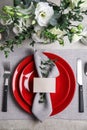 Elegant festive table setting with blank card on background, flat lay