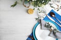 Elegant festive table setting on white background, flat lay. Space for text Royalty Free Stock Photo