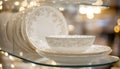 Elegant Fine China Display with Intricate Patterns in Store Window. Concept of decorative dinnerware, Luxury Dining Royalty Free Stock Photo