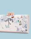 Elegant floral print pouch with white background