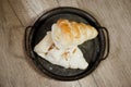 Elegant french cream horn pastries in vintage tray on wooden board Royalty Free Stock Photo