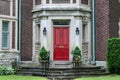 Elegant front door of house with flagstone steps