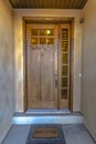 Elegant front door with a welcome mat Royalty Free Stock Photo