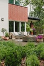 Elegant garden furniture on terrace of suburban home