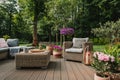 Elegant garden furniture on terrace of suburban home