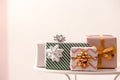 Elegant gift boxes on table against color background Royalty Free Stock Photo