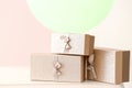 Elegant gift boxes on table against color background Royalty Free Stock Photo