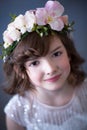 Elegant girl with a flower wreath on her head Royalty Free Stock Photo