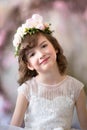Elegant girl with a flower wreath on her head Royalty Free Stock Photo