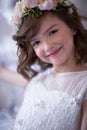 Elegant girl with a flower wreath on her head Royalty Free Stock Photo