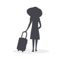 Elegant girl with a suitcase goes on a journey to adventure. She wears a beautiful dress, high heels shoes and a big straw hat. A Royalty Free Stock Photo