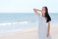 Fashion Woman in Long White Dress on the Beach Royalty Free Stock Photo