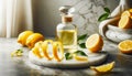 Elegant glass bottle with essential oil on marble next to sliced and whole lemons