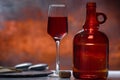 Elegant glass of red wine with carafe or decanter Royalty Free Stock Photo